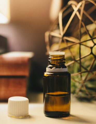 opened amber glass vial bottle